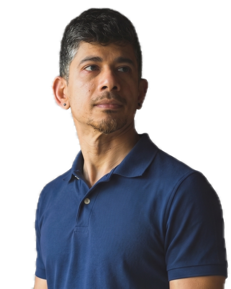 Sundar in a navy polo shirt, looking off to one side
